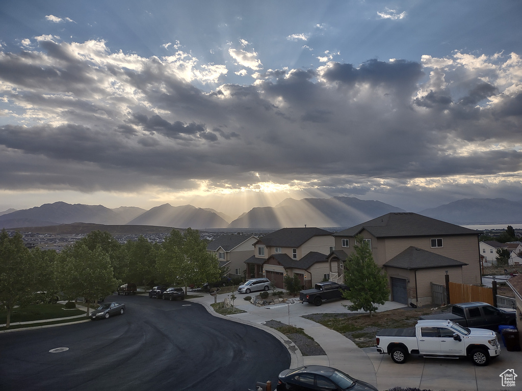Property view of mountains featuring a residential view
