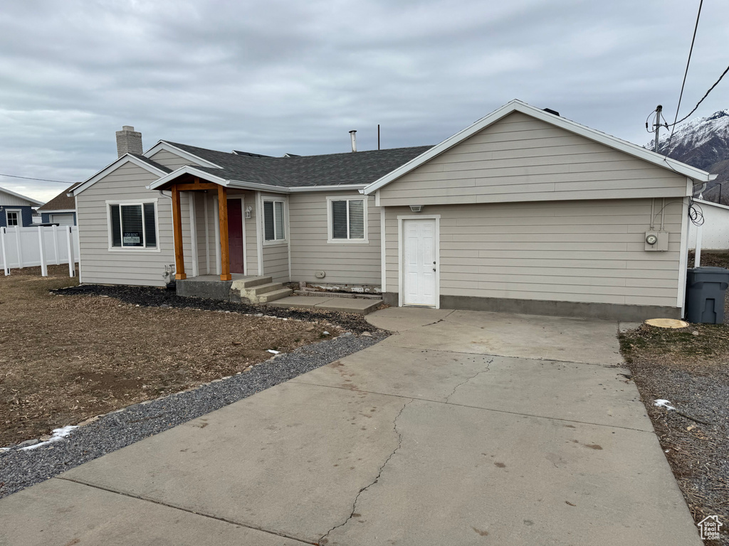 Single story home with a garage