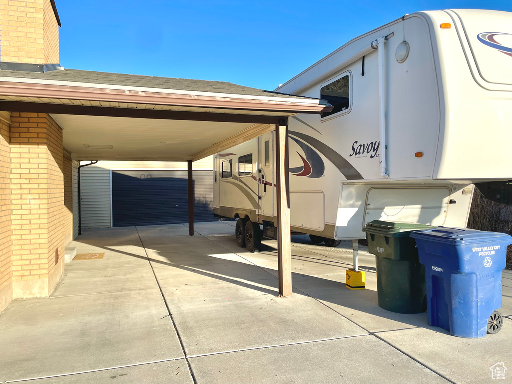 Exterior space featuring a carport