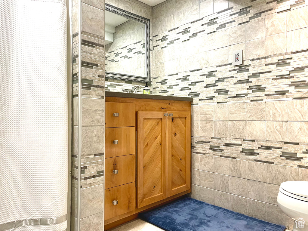 Bathroom with vanity and toilet