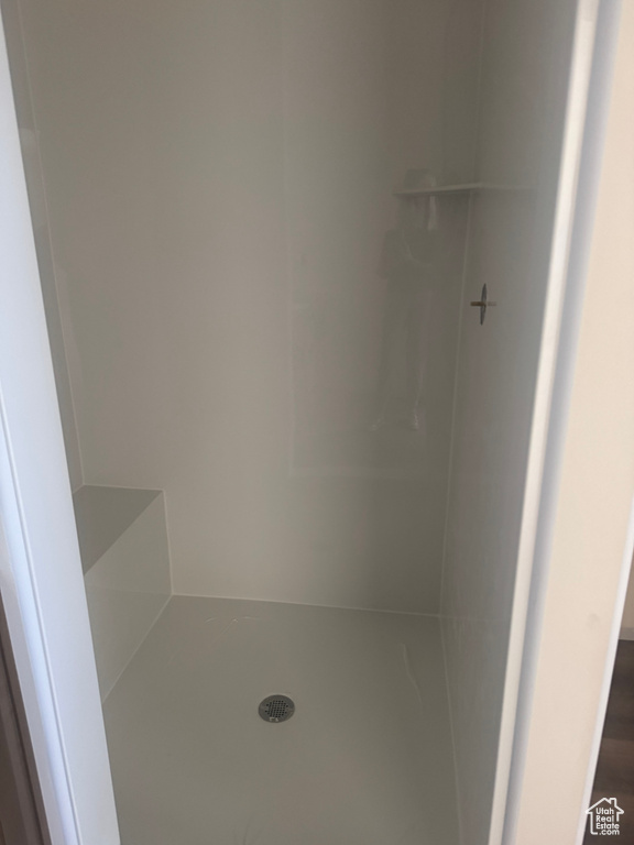 Bathroom featuring walk in shower