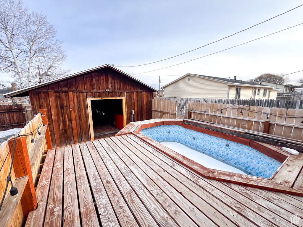 Wooden terrace with a storage unit