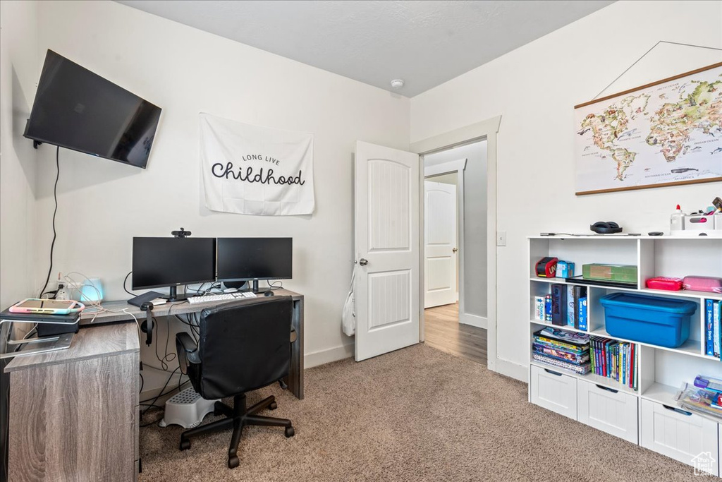 View of carpeted home office