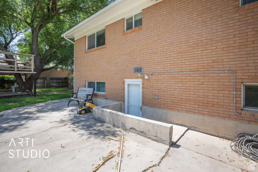Back of house with a patio area