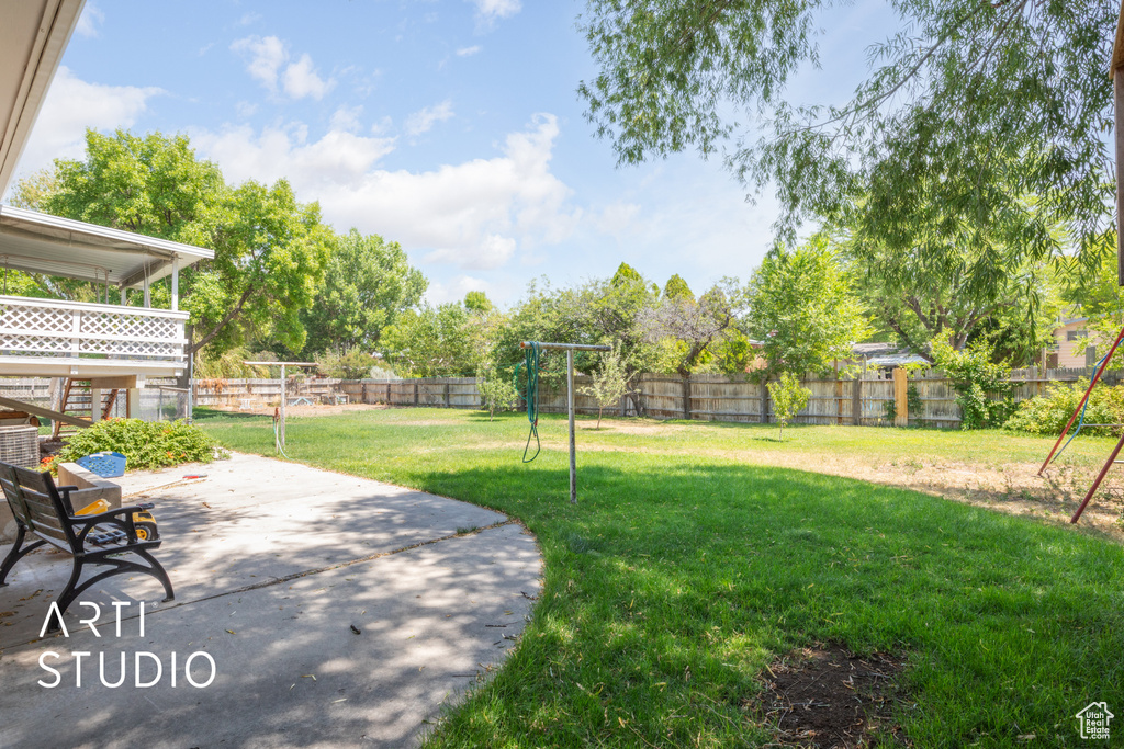 View of yard with a patio area