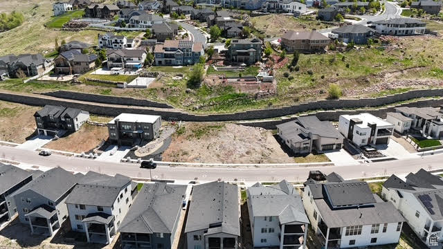 Birds eye view of property with a residential view