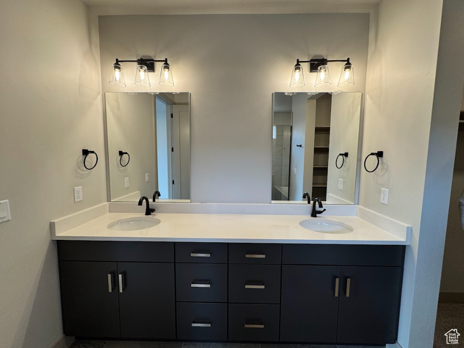 Bathroom with double vanity and a sink