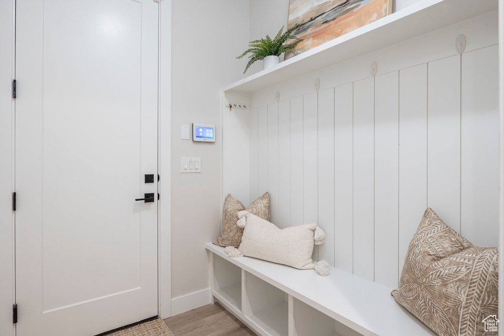 Mudroom with light wood-type flooring