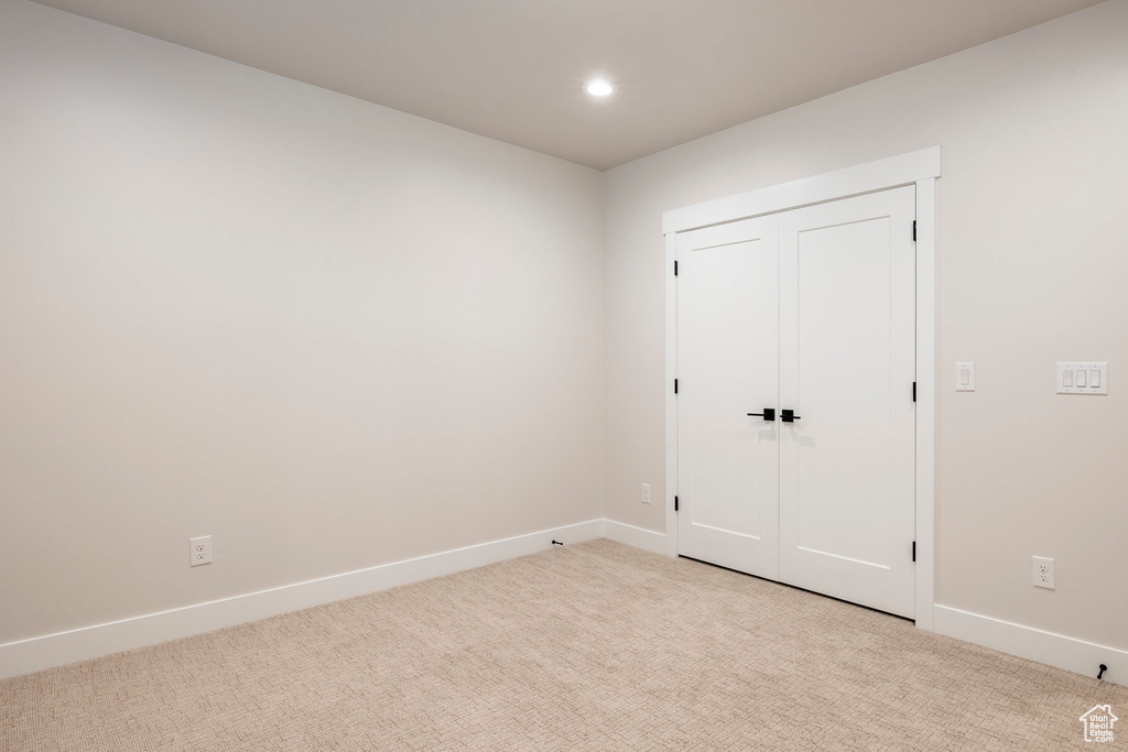 View of carpeted spare room