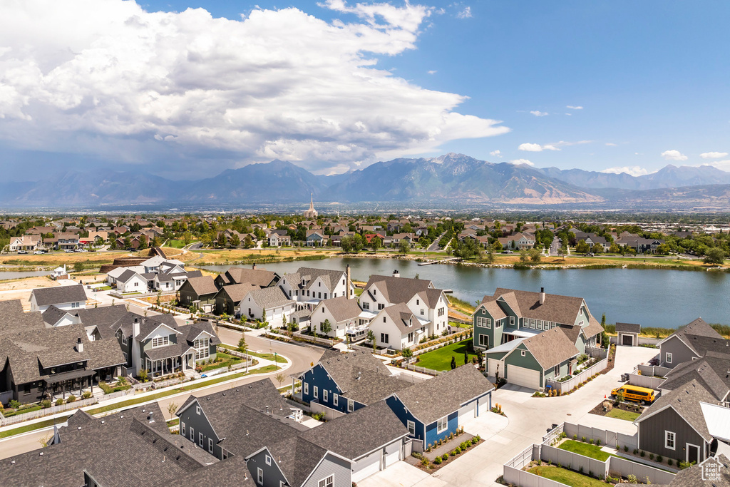 Bird's eye view featuring a water and mountain view