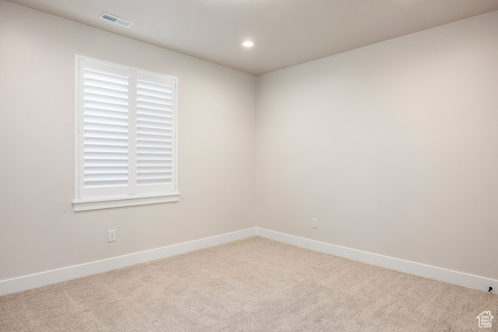 Spare room with light carpet