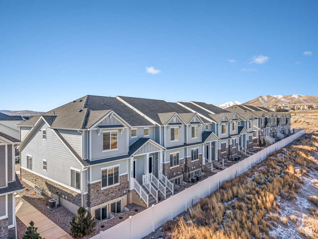 Exterior space featuring a mountain view and central air condition unit