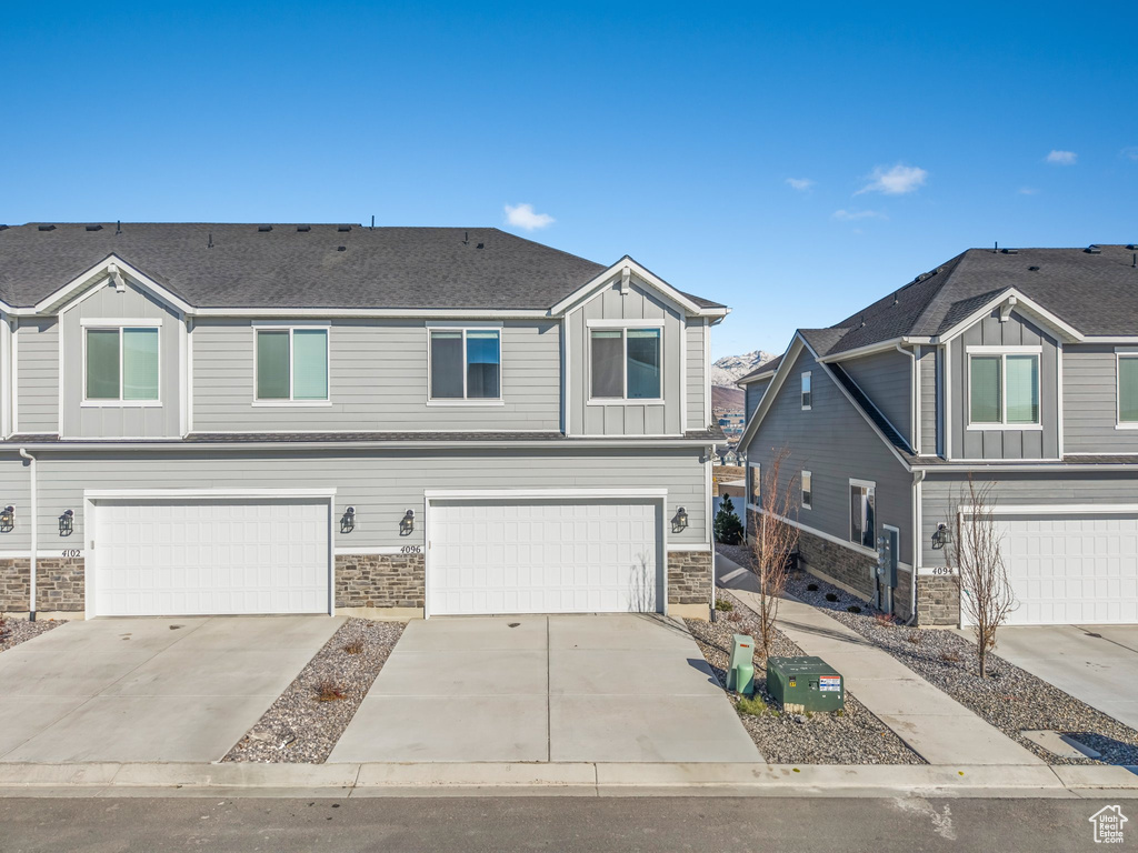 View of front of home with a garage