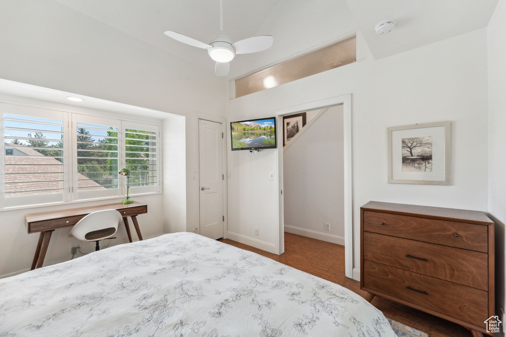 Bedroom with baseboards and ceiling fan