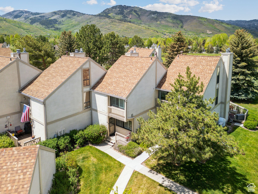 View of subject property featuring a mountain backdrop