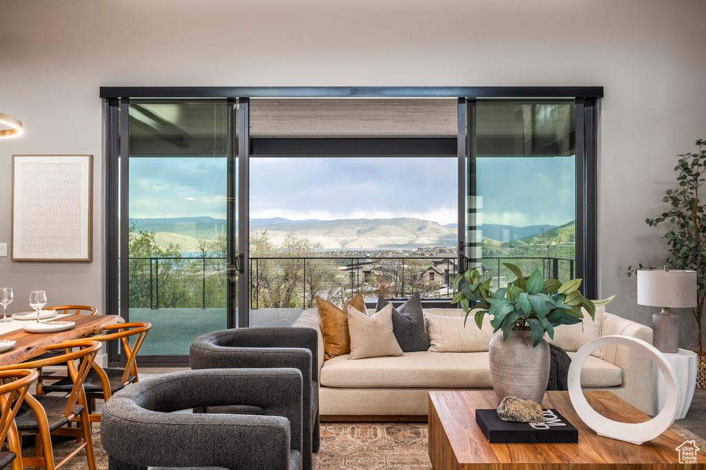 Living area featuring a mountain view and plenty of natural light