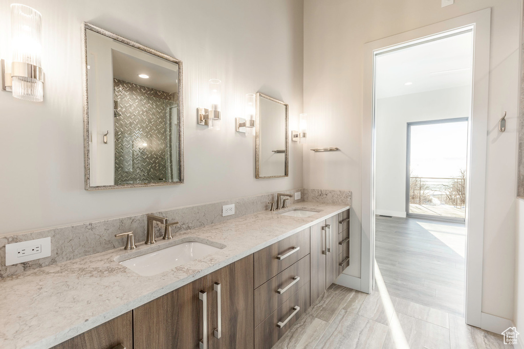 Full bathroom featuring double vanity