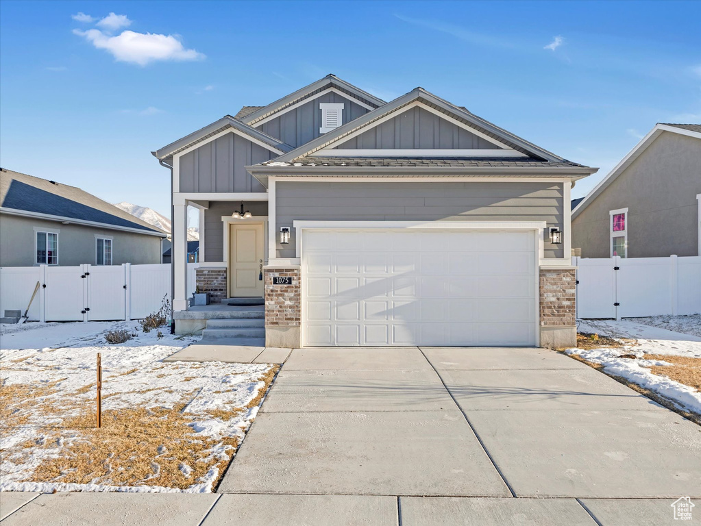 Craftsman inspired home with a garage