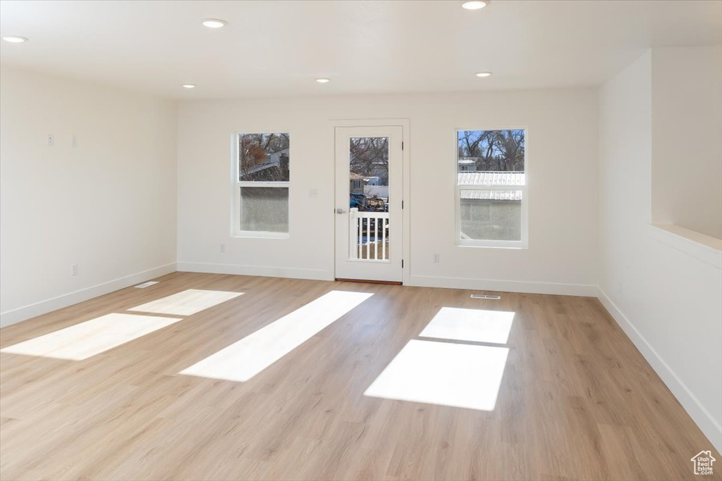 Spare room featuring light hardwood / wood-style floors