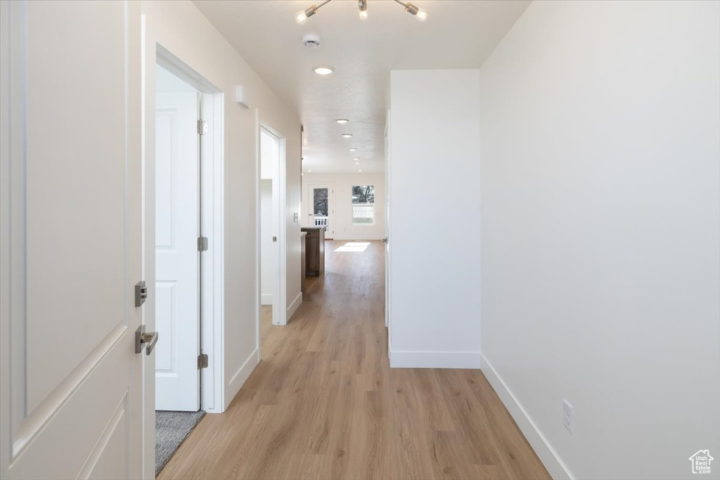 Hall with light wood-type flooring