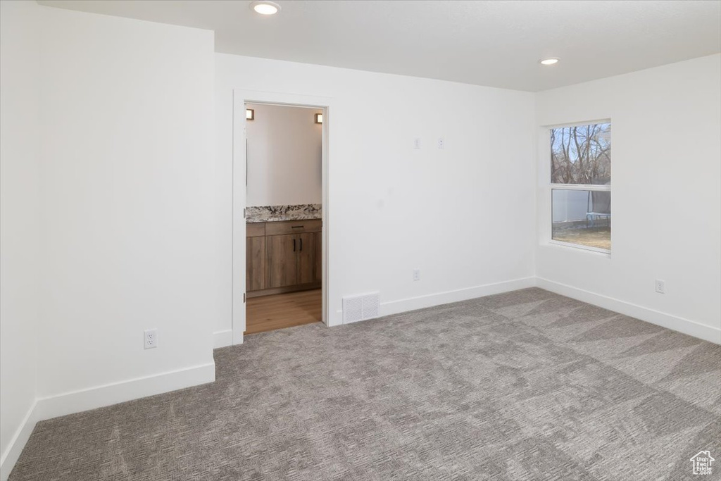 View of carpeted spare room