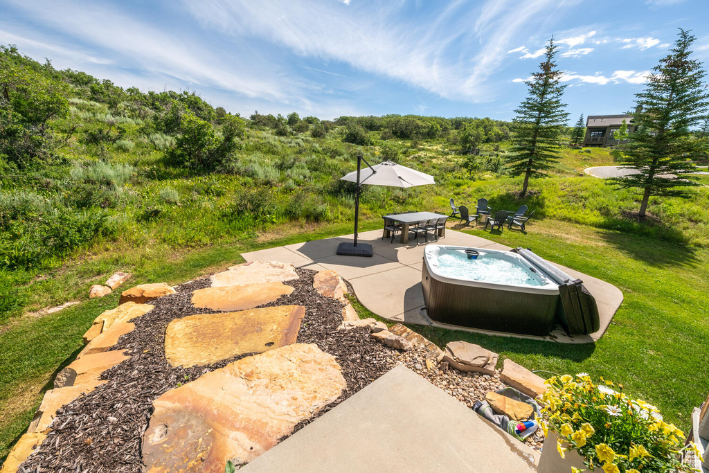View of yard with a patio
