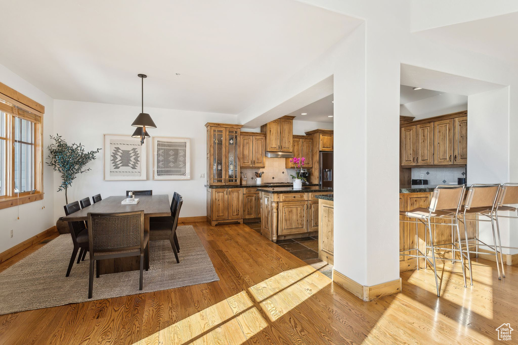 Dining space featuring light wood-type flooring