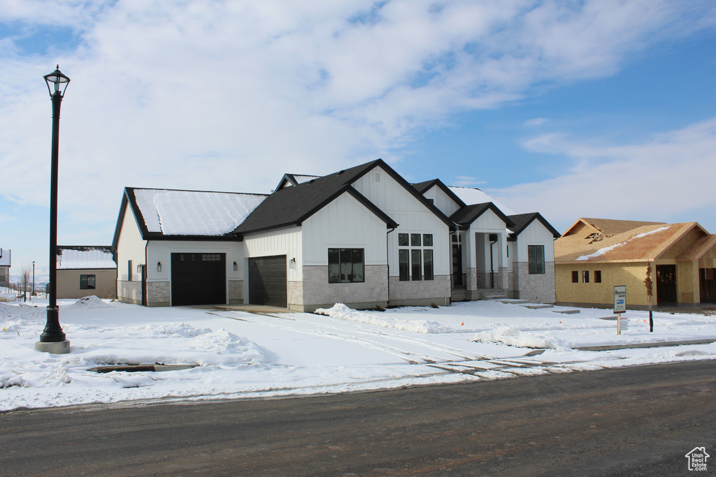 View of front facade with a garage