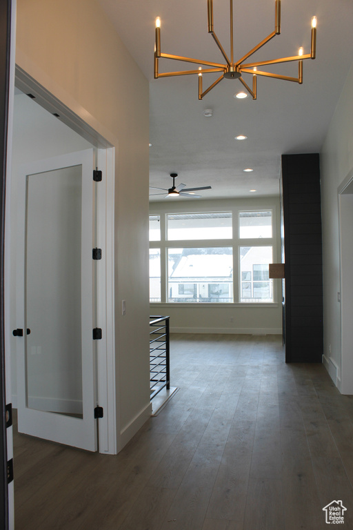 Corridor featuring dark wood-type flooring