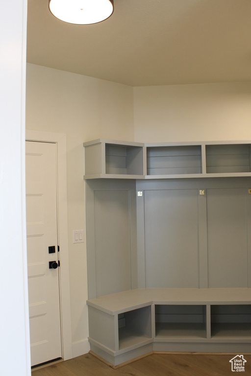 Mudroom with hardwood / wood-style floors