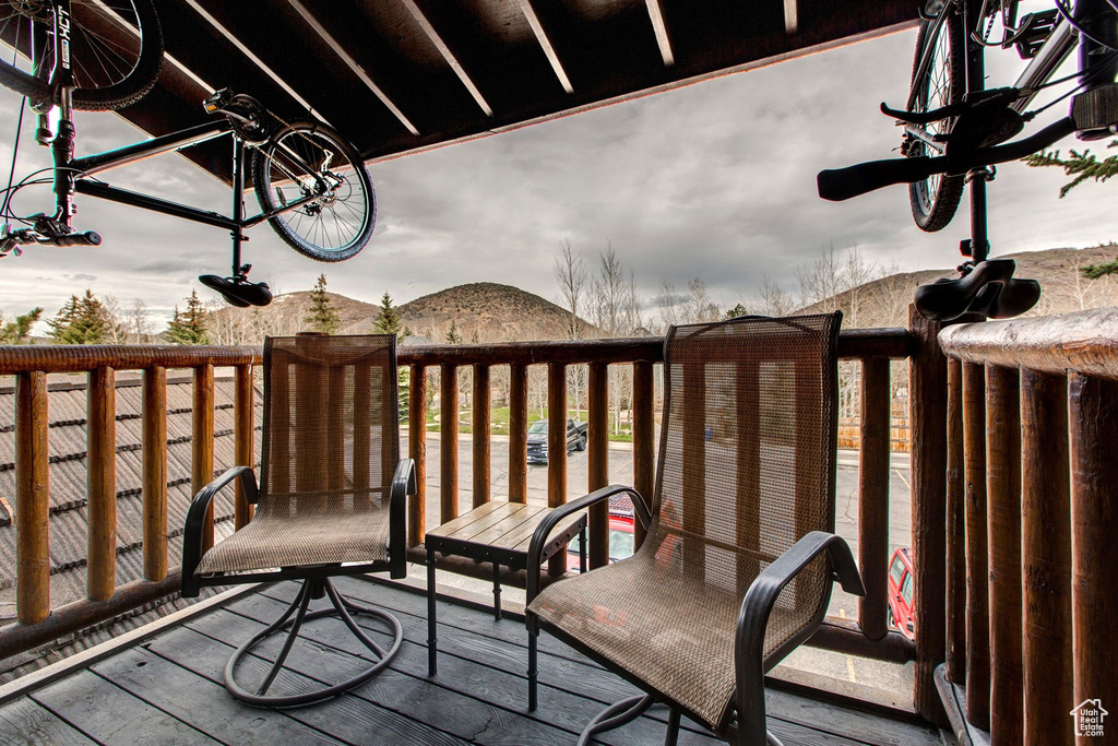Wooden balcony featuring a wooden deck
