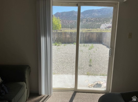 Entryway featuring a mountain view