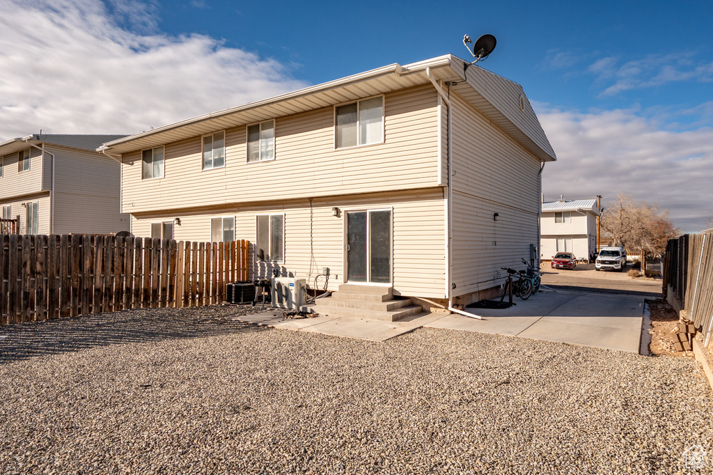 Rear view of property with a patio area