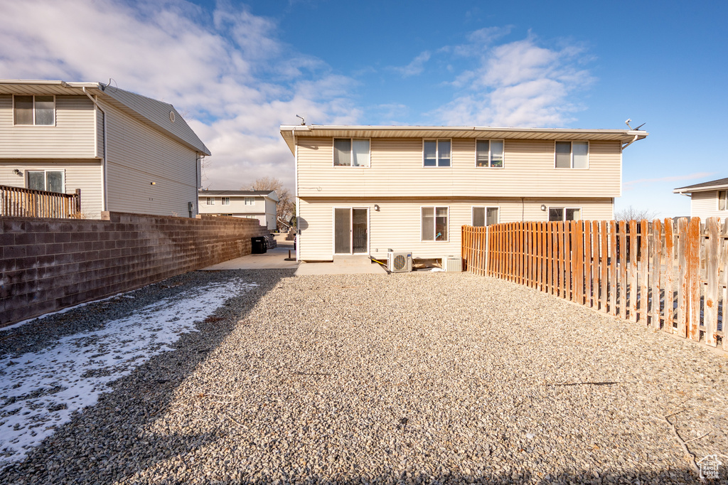 Back of property featuring a patio area