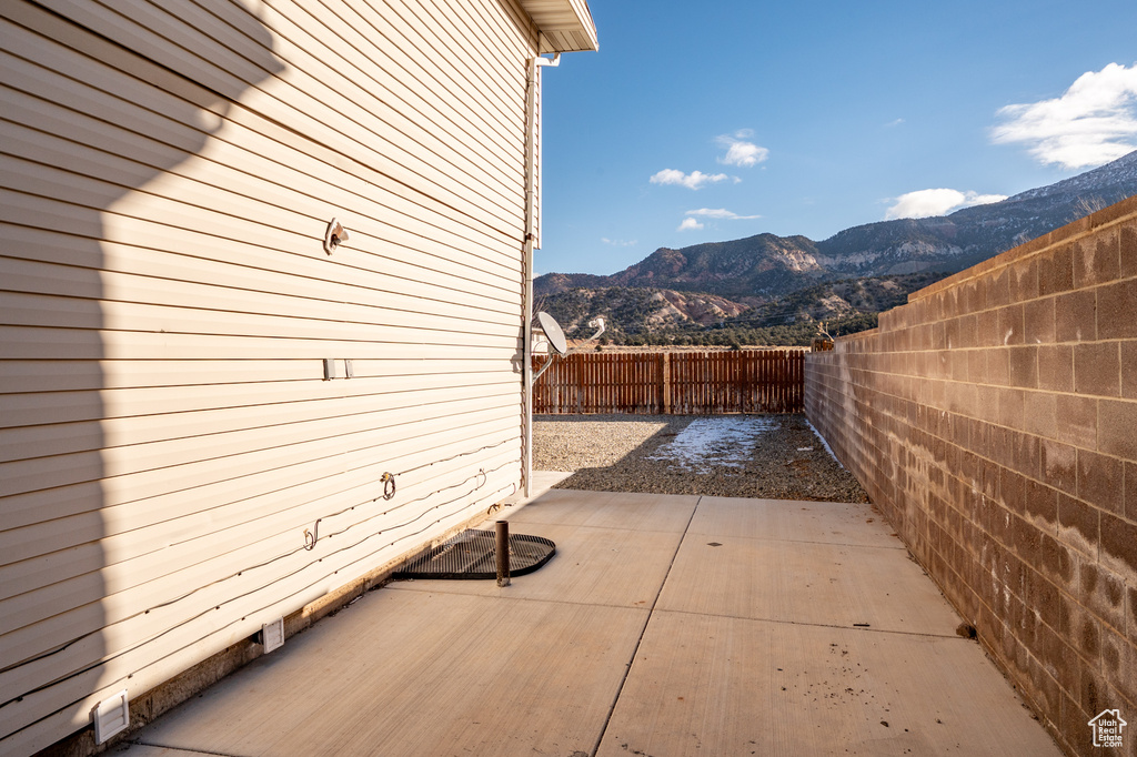 View of patio / terrace featuring a mountain view