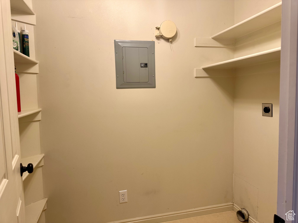 Laundry area featuring electric panel and electric dryer hookup