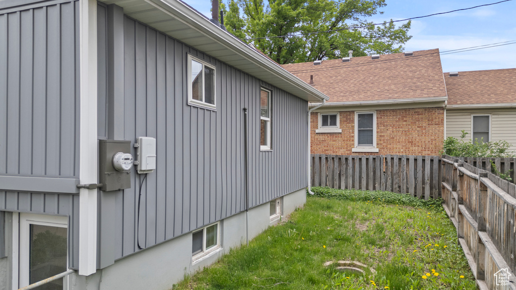 View of side of home with board and batten siding