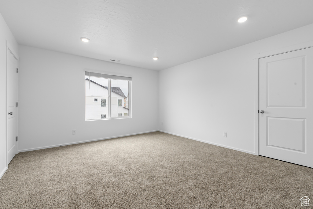 View of carpeted spare room