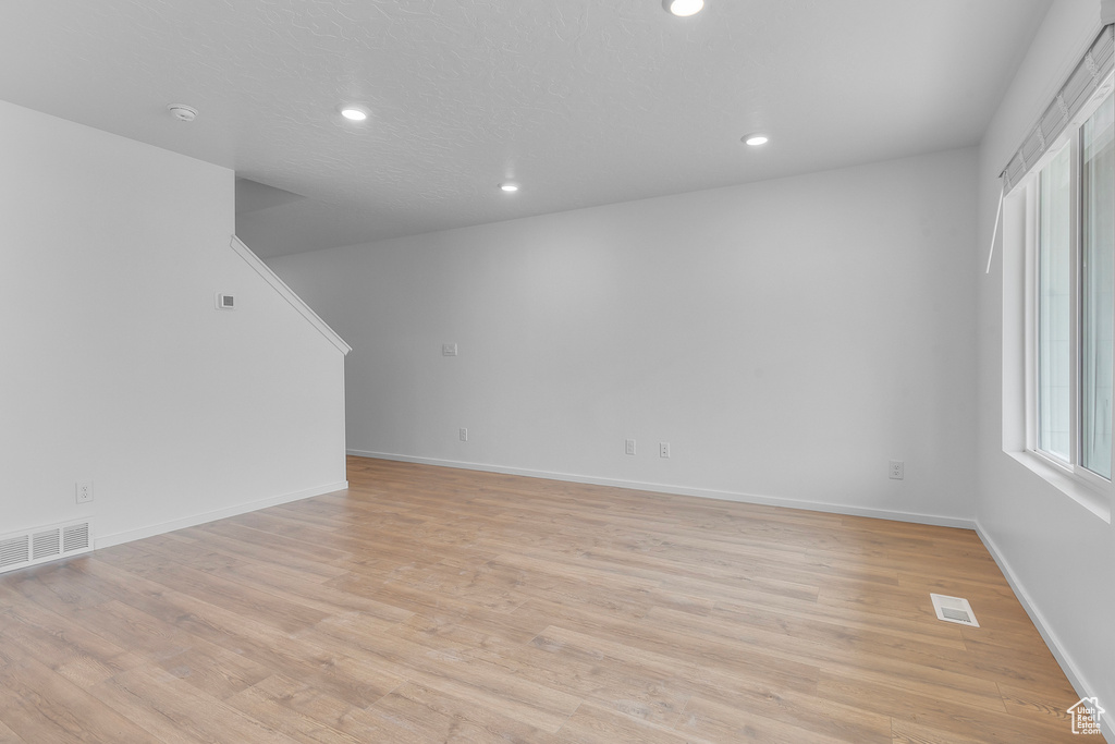 Spare room featuring light hardwood / wood-style flooring