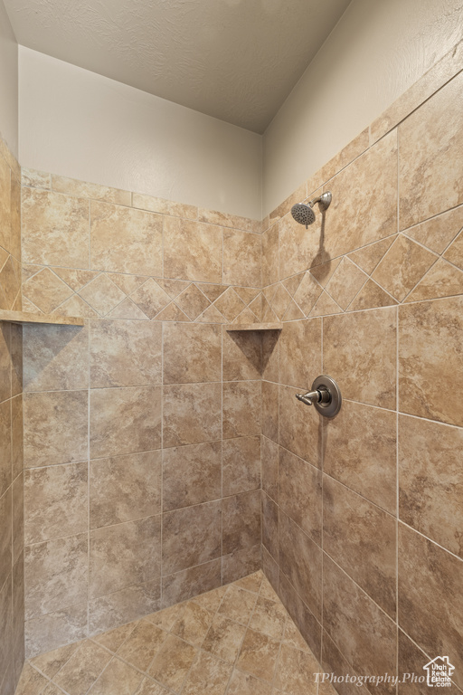 Bathroom with a tile shower