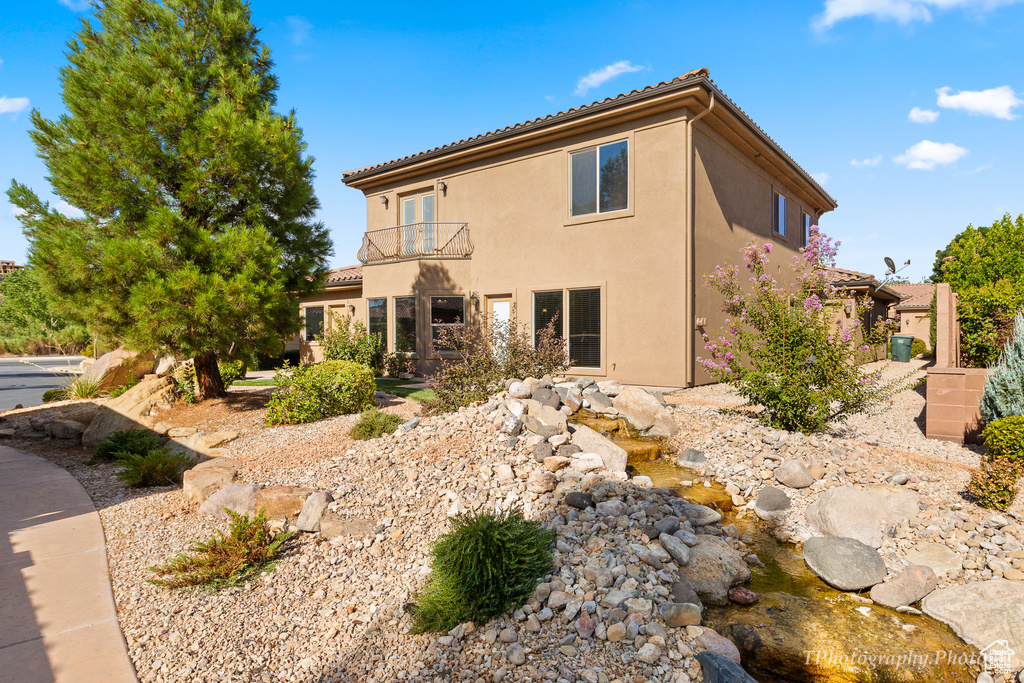 View of home\'s exterior featuring a balcony