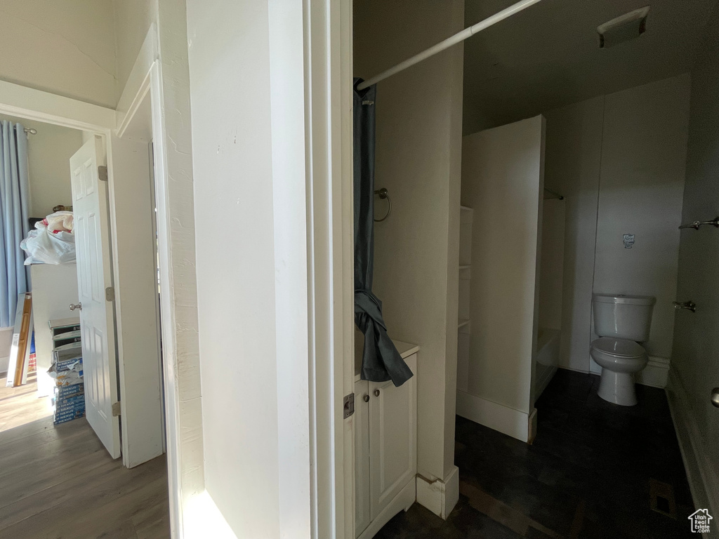 Hall with wood finished floors