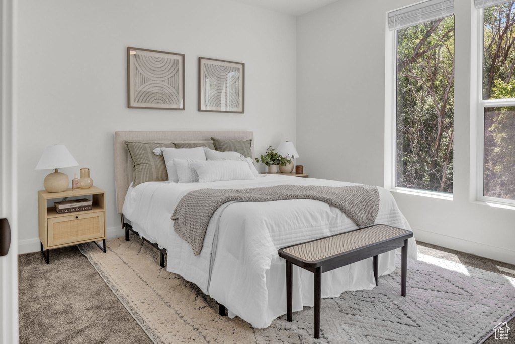 Bedroom featuring carpet