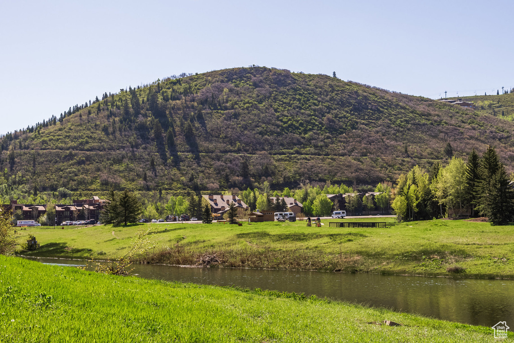 View of mountain backdrop with a nearby body of water