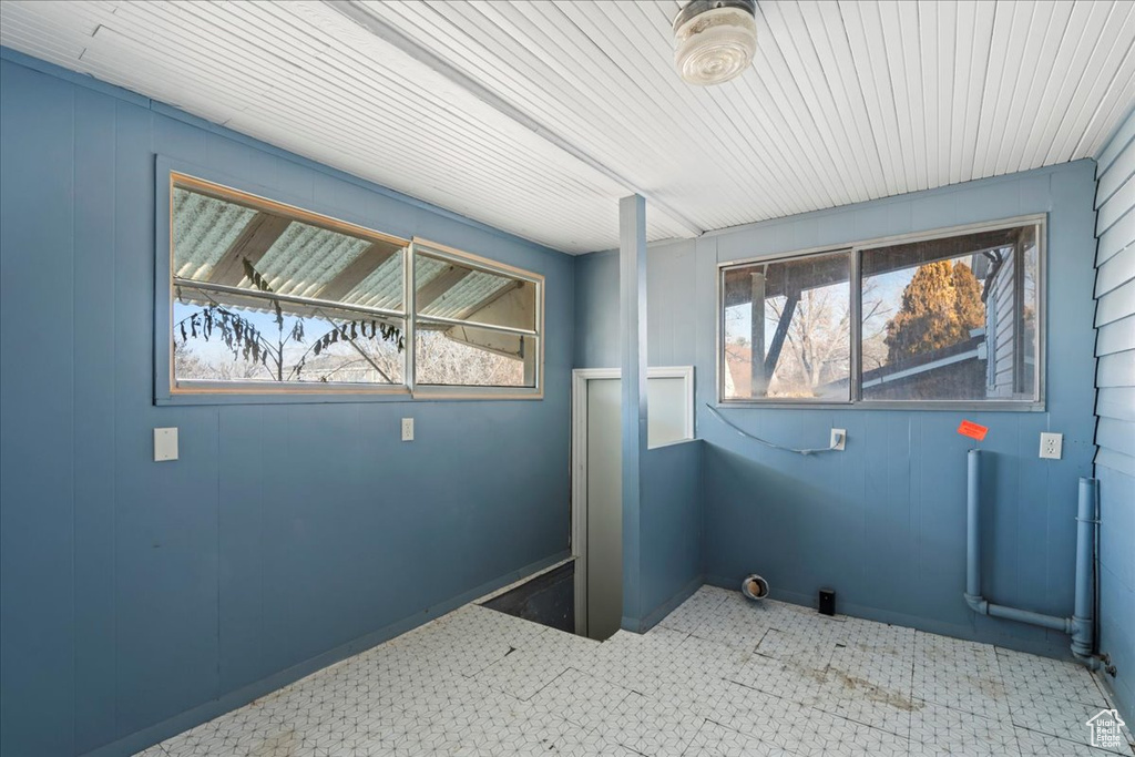 Laundry room with a wealth of natural light