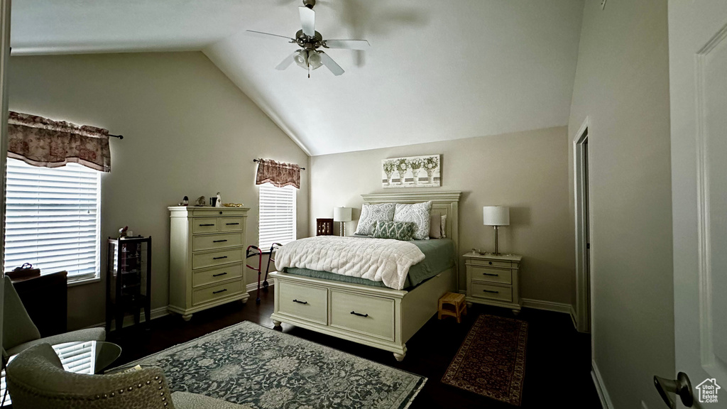 Bedroom with lofted ceiling and ceiling fan