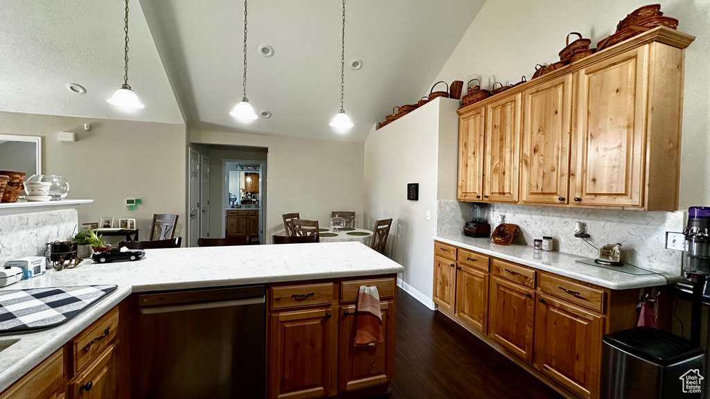 Kitchen featuring pendant lighting, black dishwasher, dark wood-type flooring, and decorative backsplash