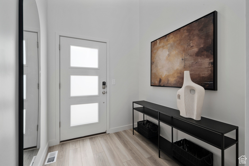Foyer featuring light hardwood / wood-style floors