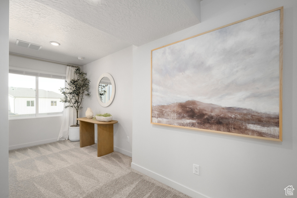Interior space with a textured ceiling