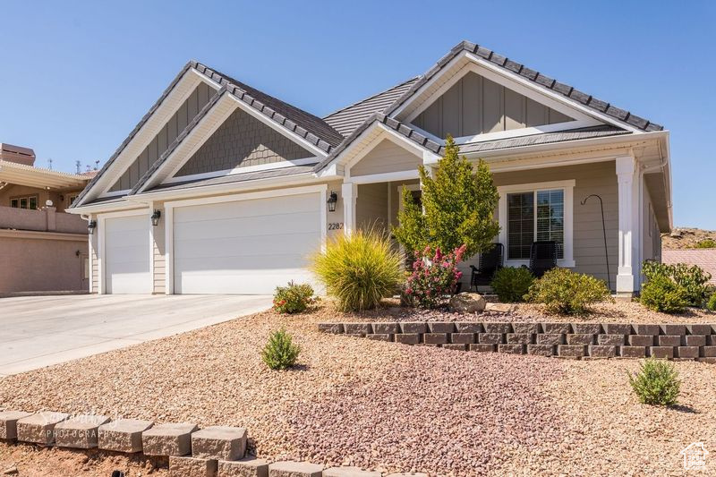 View of front of home featuring a garage